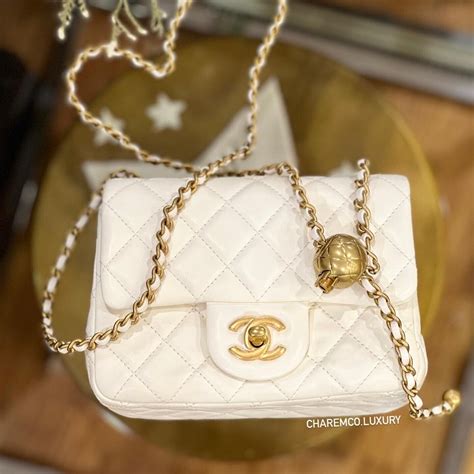 chanel mini flap bag with ball|Chanel mini flap bag with top handle.